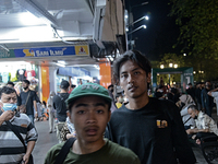 People gather at Malioboro Street during holiday for the end of the year in Yogyakarta, Indonesia on December 30, 2022, as Indonesian Presid...