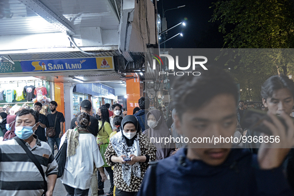 People gather at Malioboro Street during holiday for the end of the year in Yogyakarta, Indonesia on December 30, 2022, as Indonesian Presid...