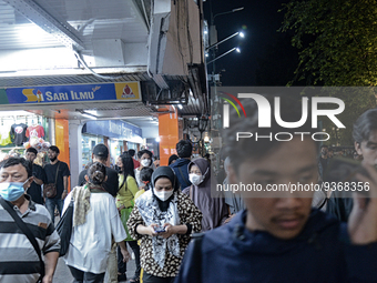 People gather at Malioboro Street during holiday for the end of the year in Yogyakarta, Indonesia on December 30, 2022, as Indonesian Presid...