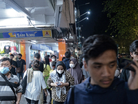 People gather at Malioboro Street during holiday for the end of the year in Yogyakarta, Indonesia on December 30, 2022, as Indonesian Presid...