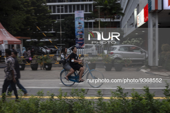 Peoples enjoy their vacation at the the Kota Tua Jakarta (Jakarta Old Town) tourism area during the holiday season, in Jakarta on December 3...