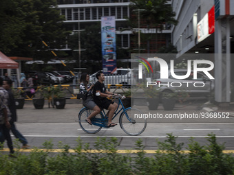 Peoples enjoy their vacation at the the Kota Tua Jakarta (Jakarta Old Town) tourism area during the holiday season, in Jakarta on December 3...