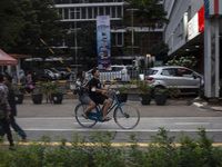 Peoples enjoy their vacation at the the Kota Tua Jakarta (Jakarta Old Town) tourism area during the holiday season, in Jakarta on December 3...