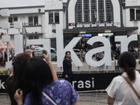 Peoples enjoy their vacation at the the Kota Tua Jakarta (Jakarta Old Town) tourism area during the holiday season, in Jakarta on December 3...