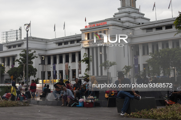 Peoples enjoy their vacation at the the Kota Tua Jakarta (Jakarta Old Town) tourism area during the holiday season, in Jakarta on December 3...