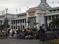 Peoples enjoy their vacation at the the Kota Tua Jakarta (Jakarta Old Town) tourism area during the holiday season, in Jakarta on December 3...