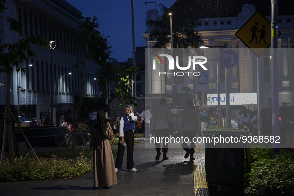 Peoples enjoy their vacation at the the Kota Tua Jakarta (Jakarta Old Town) tourism area during the holiday season, in Jakarta on December 3...