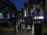 Peoples enjoy their vacation at the the Kota Tua Jakarta (Jakarta Old Town) tourism area during the holiday season, in Jakarta on December 3...