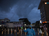 Peoples crossing the road as they visiting the Kota Tua Jakarta (Jakarta Old Town) tourism area during the holiday season, in Jakarta on Dec...