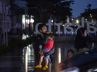 Peoples enjoy their vacation at the the Kota Tua Jakarta (Jakarta Old Town) tourism area during the holiday season, in Jakarta on December 3...