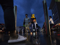 Peoples crossing the road as they visiting the Kota Tua Jakarta (Jakarta Old Town) tourism area during the holiday season, in Jakarta on Dec...