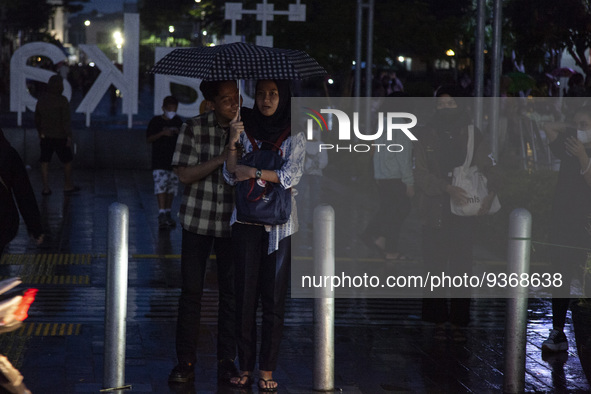 Peoples enjoy a vacation at the Kota Tua tourism area, in Jakarta on December 30, 2022. President Joko Widodo, officially announced the lift...