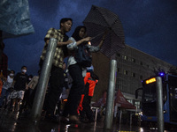 Peoples crossing the road as they visiting the Kota Tua Jakarta (Jakarta Old Town) tourism area during the holiday season, in Jakarta on Dec...