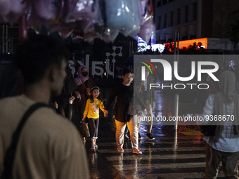 Peoples crossing the road as they visiting the Kota Tua Jakarta (Jakarta Old Town) tourism area during the holiday season, in Jakarta on Dec...