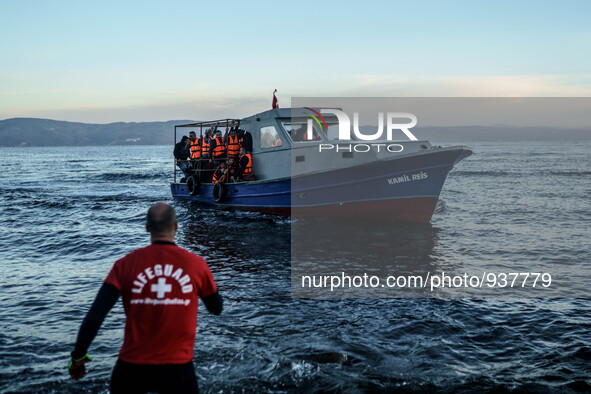 Migrants approach the coast of the northeastern Greek island of Lesbos on Thursday, Dec. 1, 2015. About 5,000 migrants are reaching Europe e...