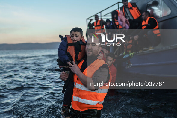 Migrants approach the coast of the northeastern Greek island of Lesbos on Thursday, Dec. 1, 2015. About 5,000 migrants are reaching Europe e...