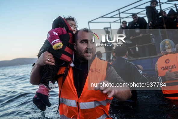 Migrants approach the coast of the northeastern Greek island of Lesbos on Thursday, Dec. 1, 2015. About 5,000 migrants are reaching Europe e...