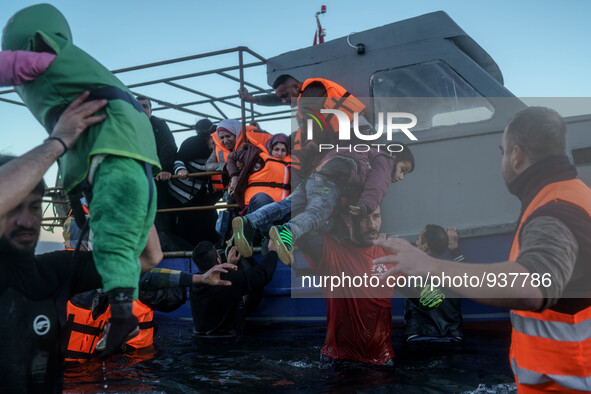 Migrants approach the coast of the northeastern Greek island of Lesbos on Thursday, Dec. 1, 2015. About 5,000 migrants are reaching Europe e...