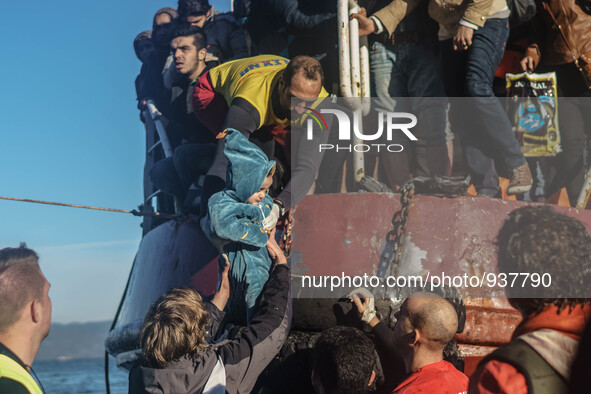 Migrants approach the coast of the northeastern Greek island of Lesbos on Thursday, Dec. 1, 2015. About 5,000 migrants are reaching Europe e...