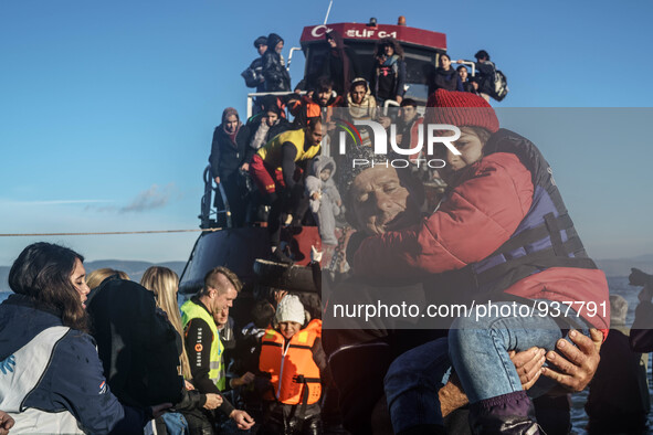 Migrants approach the coast of the northeastern Greek island of Lesbos on Thursday, Dec. 1, 2015. About 5,000 migrants are reaching Europe e...