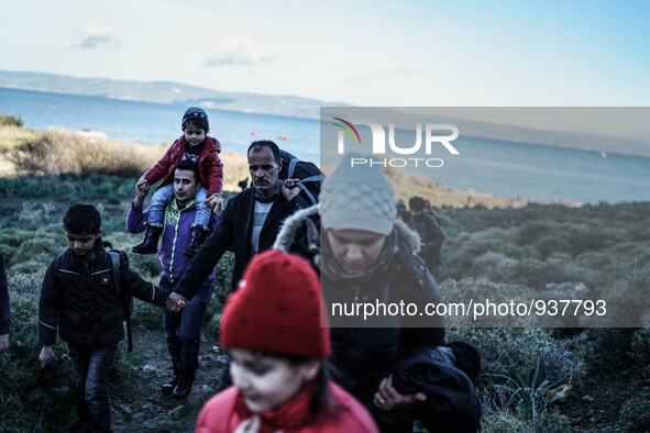 Migrants approach the coast of the northeastern Greek island of Lesbos on Thursday, Dec. 1, 2015. About 5,000 migrants are reaching Europe e...