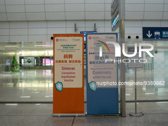 (Left) A sign for the Sinovac CoronaVac Inactivated Vaccine by China Biotechnology company, Sinovac Biotech Ltd., and (Right)a sign for the...