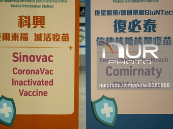 (Left) A sign for the Sinovac CoronaVac Inactivated Vaccine by China Biotechnology company, Sinovac Biotech Ltd., and (Right)a sign for the...