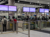 Mainland Residents lining up at an Immigration checkpoint at Lok Ma Chau Control Point on January 8, 2023 in Hong Kong, China. Hong Kong tod...