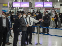 Hong Kong Chief Executive John Lee inspecting an Immigration checkpoint at Lok Ma Chau Control Point on January 8, 2023 in Hong Kong, China....