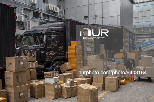 Boxes waiting to be loaded into a truck Huaqiangbei, a popular place to buy electronic goods on January 8, 2023 in Shenzhen, China. China to...