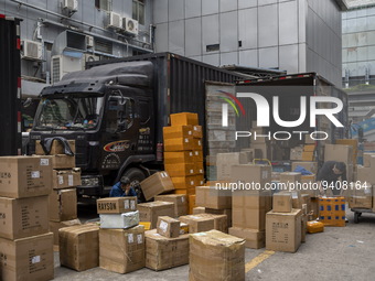 Boxes waiting to be loaded into a truck Huaqiangbei, a popular place to buy electronic goods on January 8, 2023 in Shenzhen, China. China to...