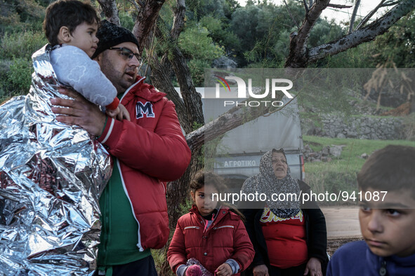 Migrants approach the coast of the northeastern Greek island of Lesbos on Thursday, Dec. 3, 2015. About 5,000 migrants are reaching Europe e...