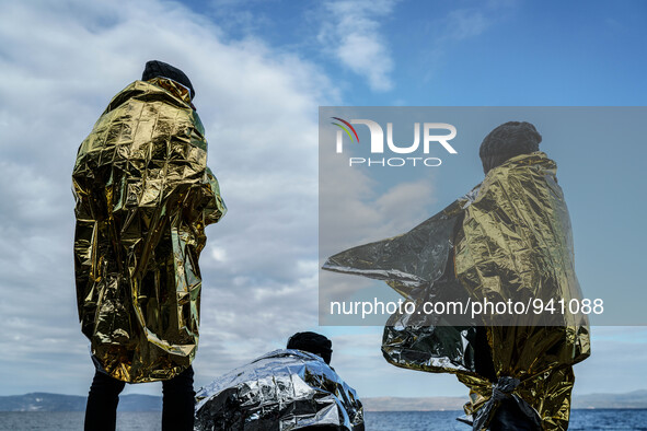 Migrants approach the coast of the northeastern Greek island of Lesbos on Thursday, Dec. 3, 2015. About 5,000 migrants are reaching Europe e...