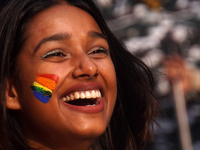 A participant with a rainbow painted face takes part in the annual Delhi Queer Pride March, an event promoting lesbian, gay, bisexual and tr...