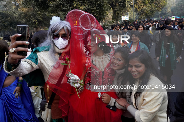 Participants click a picture as they take part in the annual Delhi Queer Pride March, an event promoting lesbian, gay, bisexual and transgen...