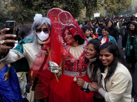 Participants click a picture as they take part in the annual Delhi Queer Pride March, an event promoting lesbian, gay, bisexual and transgen...