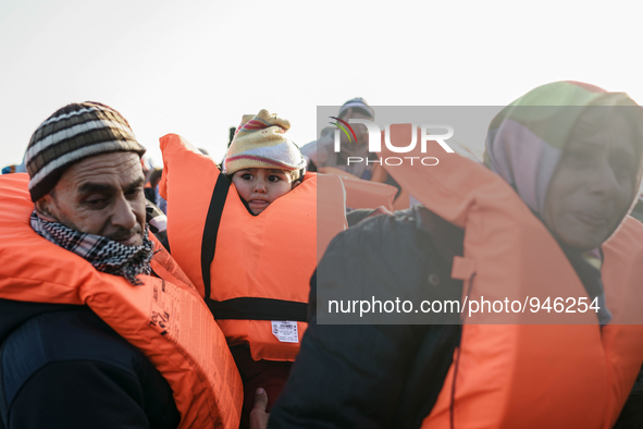 Migrants approach the coast of the northeastern Greek island of Lesbos on Thursday, Dec. 6, 2015. About 5,000 migrants are reaching Europe e...