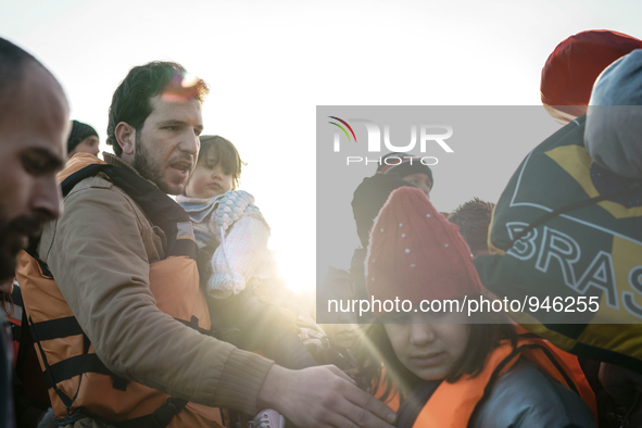 Migrants approach the coast of the northeastern Greek island of Lesbos on Thursday, Dec. 6, 2015. About 5,000 migrants are reaching Europe e...