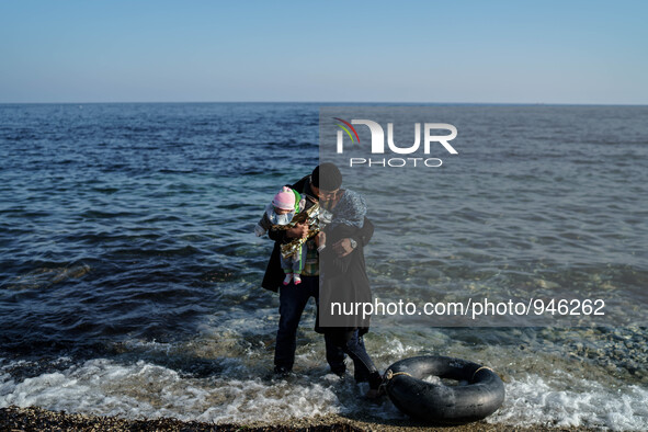 Migrants approach the coast of the northeastern Greek island of Lesbos on Thursday, Dec. 6, 2015. About 5,000 migrants are reaching Europe e...