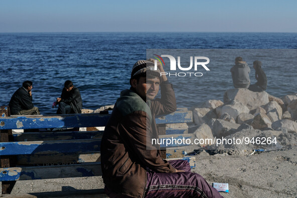 Migrants approach the coast of the northeastern Greek island of Lesbos on Thursday, Dec. 6, 2015. About 5,000 migrants are reaching Europe e...