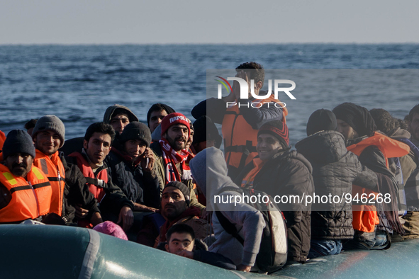 Migrants approach the coast of the northeastern Greek island of Lesbos on Thursday, Dec. 6, 2015. About 5,000 migrants are reaching Europe e...