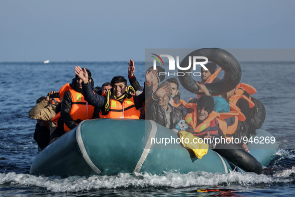 Migrants approach the coast of the northeastern Greek island of Lesbos on Thursday, Dec. 6, 2015. About 5,000 migrants are reaching Europe e...