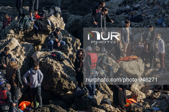 Migrants approach the coast of the northeastern Greek island of Lesbos on Thursday, Dec. 6, 2015. About 5,000 migrants are reaching Europe e...