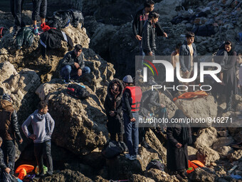 Migrants approach the coast of the northeastern Greek island of Lesbos on Thursday, Dec. 6, 2015. About 5,000 migrants are reaching Europe e...