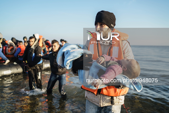 Migrants approach the coast of the northeastern Greek island of Lesbos on Thursday, Dec. 7, 2015. About 5,000 migrants are reaching Europe e...