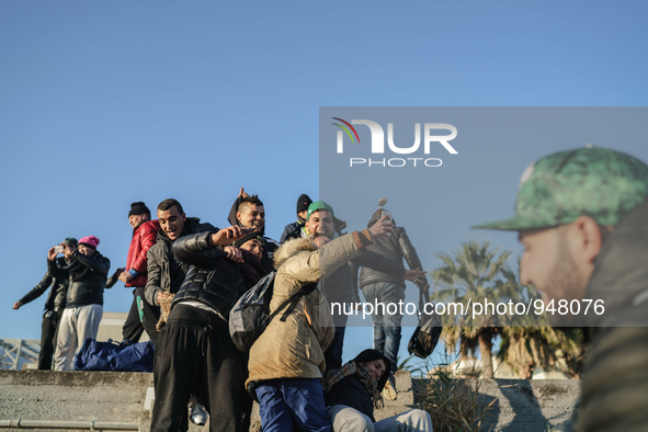 Migrants approach the coast of the northeastern Greek island of Lesbos on Thursday, Dec. 7, 2015. About 5,000 migrants are reaching Europe e...