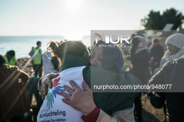 Migrants approach the coast of the northeastern Greek island of Lesbos on Thursday, Dec. 7, 2015. About 5,000 migrants are reaching Europe e...