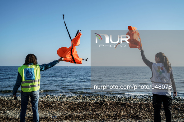 Migrants approach the coast of the northeastern Greek island of Lesbos on Thursday, Dec. 7, 2015. About 5,000 migrants are reaching Europe e...