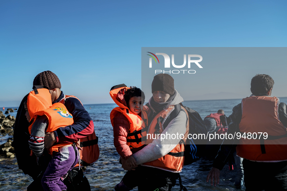 Migrants approach the coast of the northeastern Greek island of Lesbos on Thursday, Dec. 7, 2015. About 5,000 migrants are reaching Europe e...