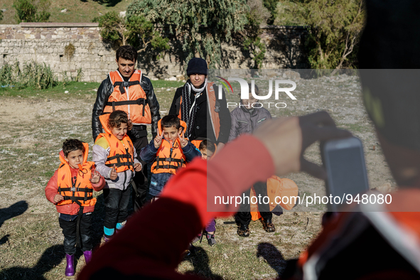 Migrants approach the coast of the northeastern Greek island of Lesbos on Thursday, Dec. 7, 2015. About 5,000 migrants are reaching Europe e...